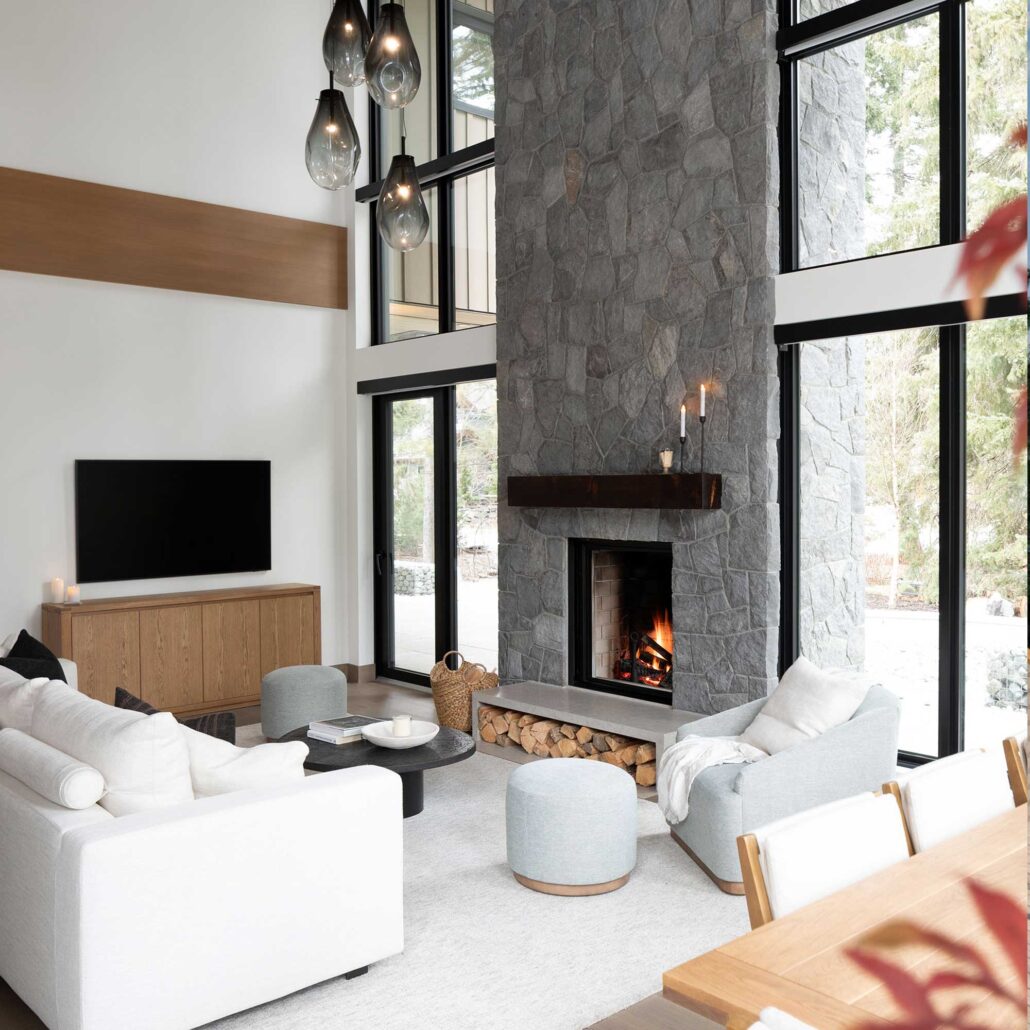 rock wall fireplace is the feature point of the room